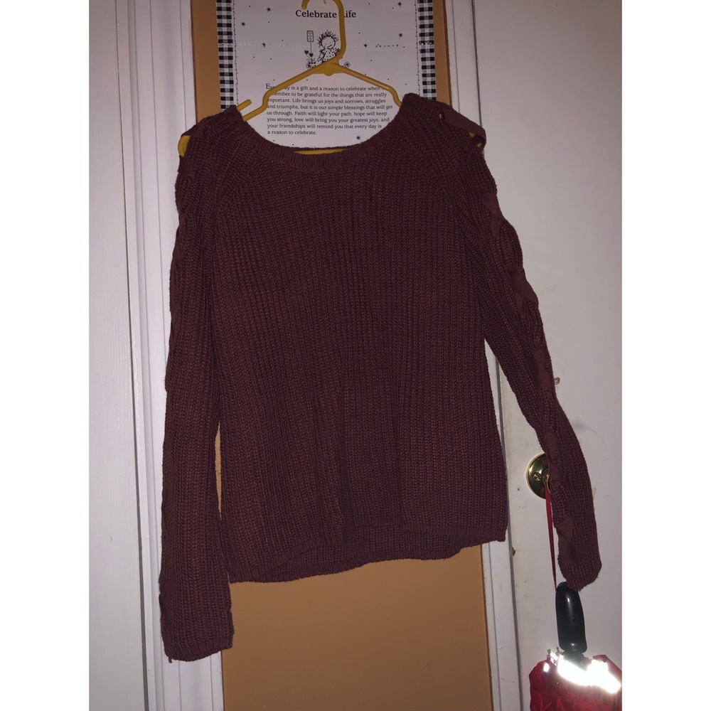 Sweater with tie up arms